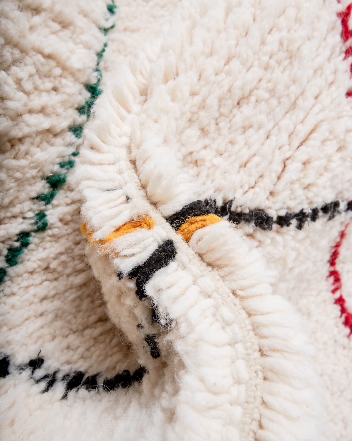 Modern, designer, handcrafted Berber rug from Morocco. Beniourain carpet with beautiful colours and patterns and fluffy wool texture.